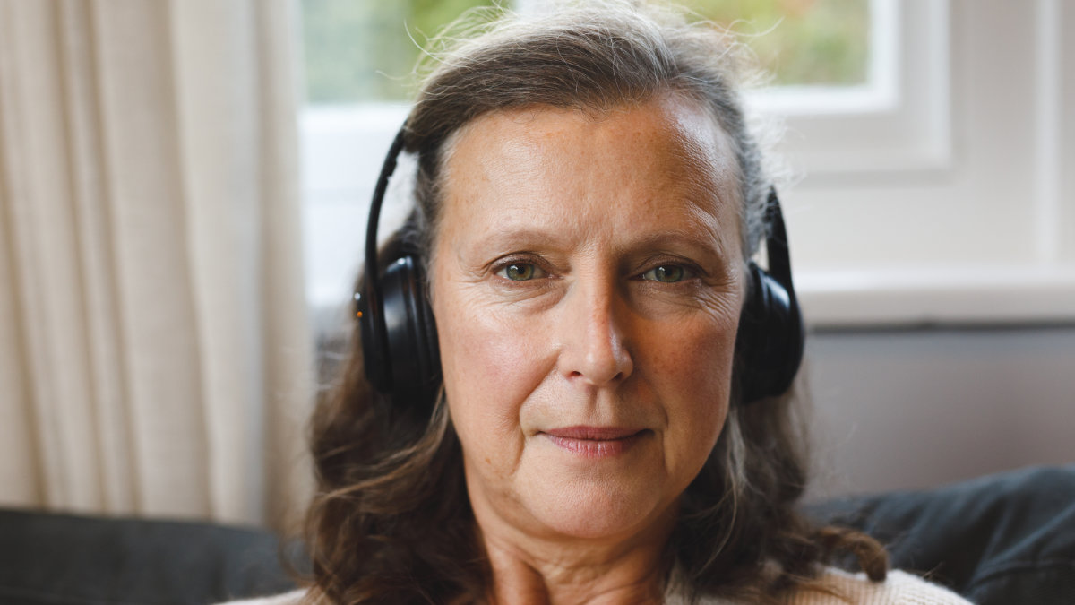 woman listening with headphones on
